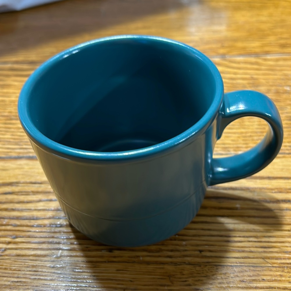 10 Strawberry Street solid teal mug. Approximately 3” Dishwasher safe.